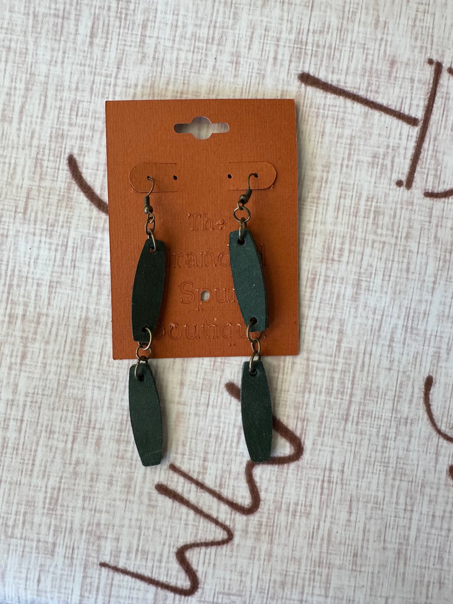 Green leather stacked earrings