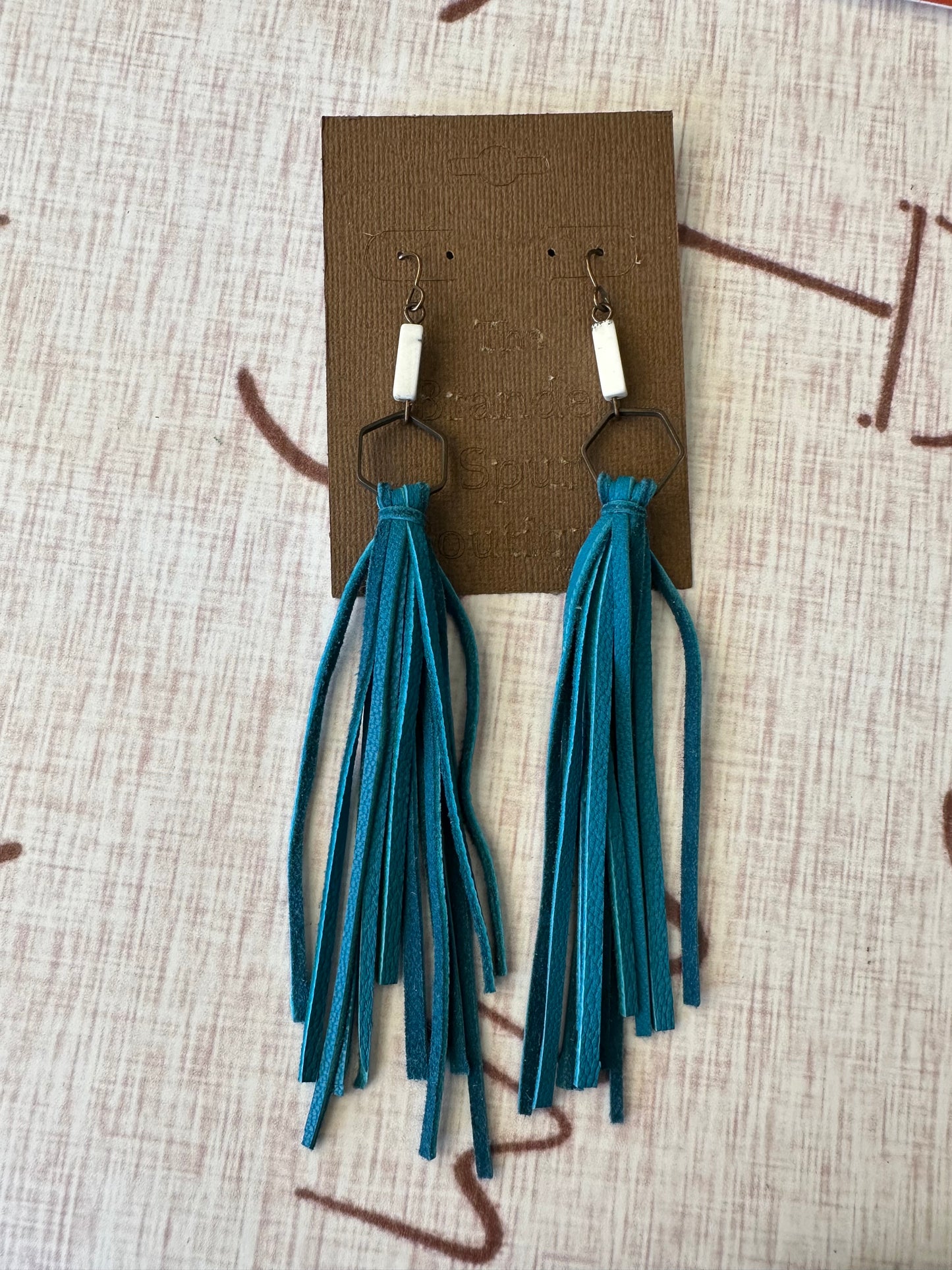 Dark teal fringe earrings w/white stone