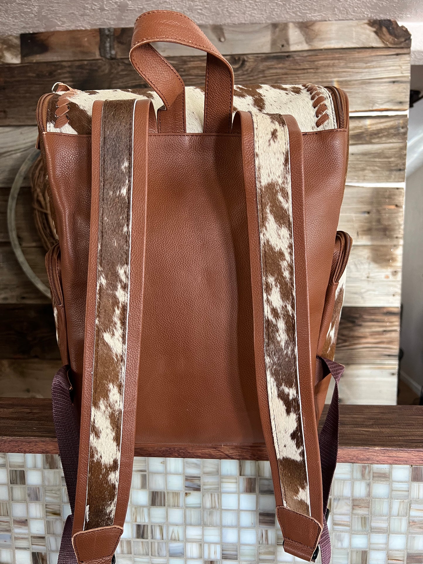 Laced Cowhide Backpack