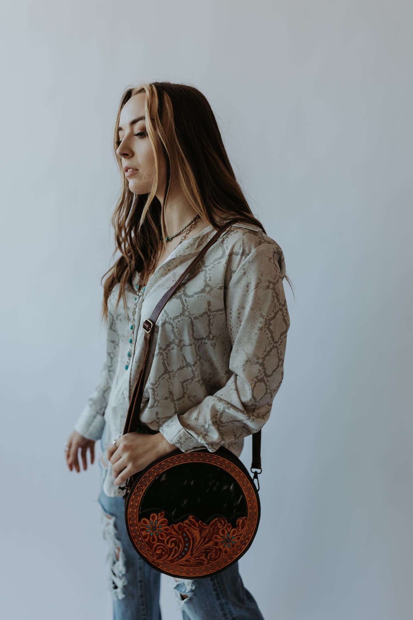 Black Cowhide and Tooled Leather Canteen Purse